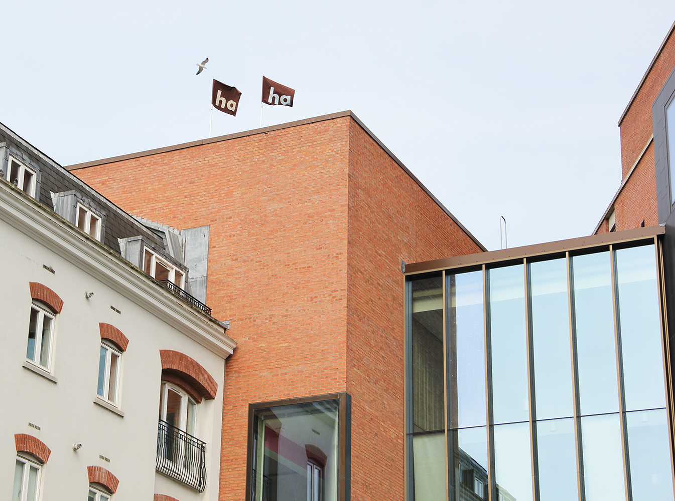 Image of two 'ha ha' flags on the MAC Art Centre building - clearly displaying 'ha ha'.